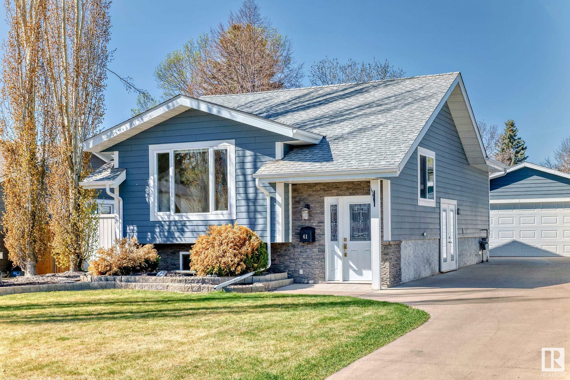 Property Photo: 61 Woodbine Road AB T8A 4A7
