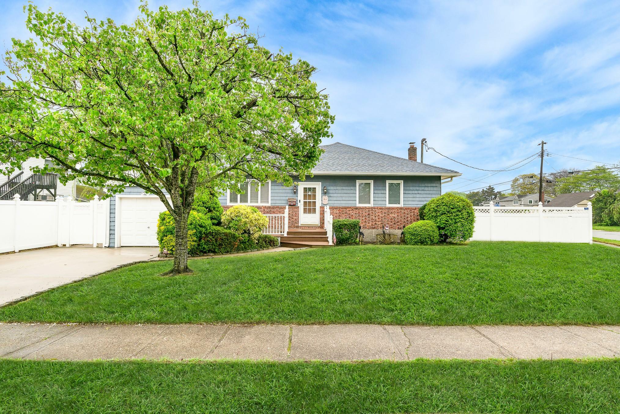 Property Photo: 4 Edmore Lane S NY 11795
