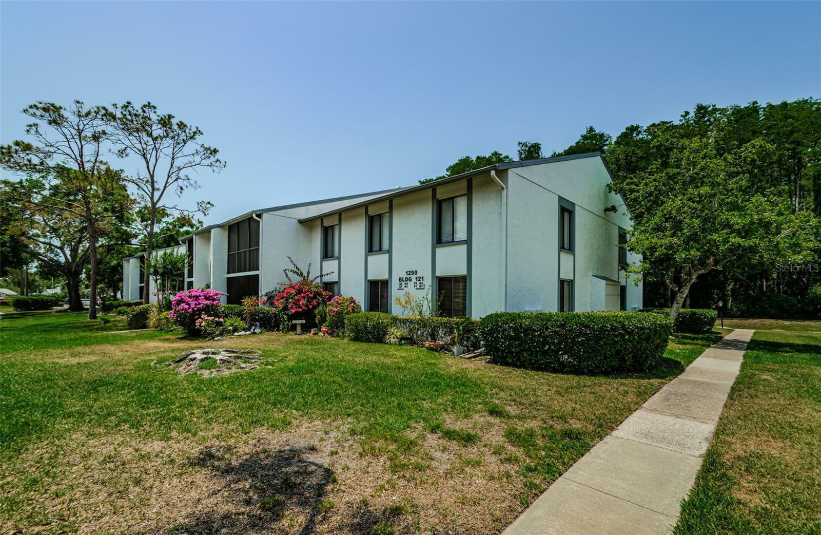 Property Photo: 1290 Pine Ridge Circle E G1 FL 34688