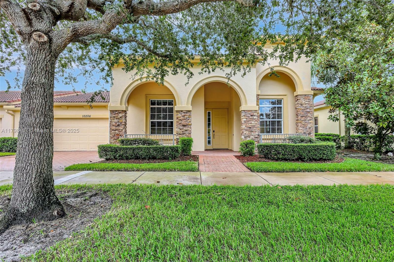 Property Photo: 10206 SW Ambrose Way FL 34986