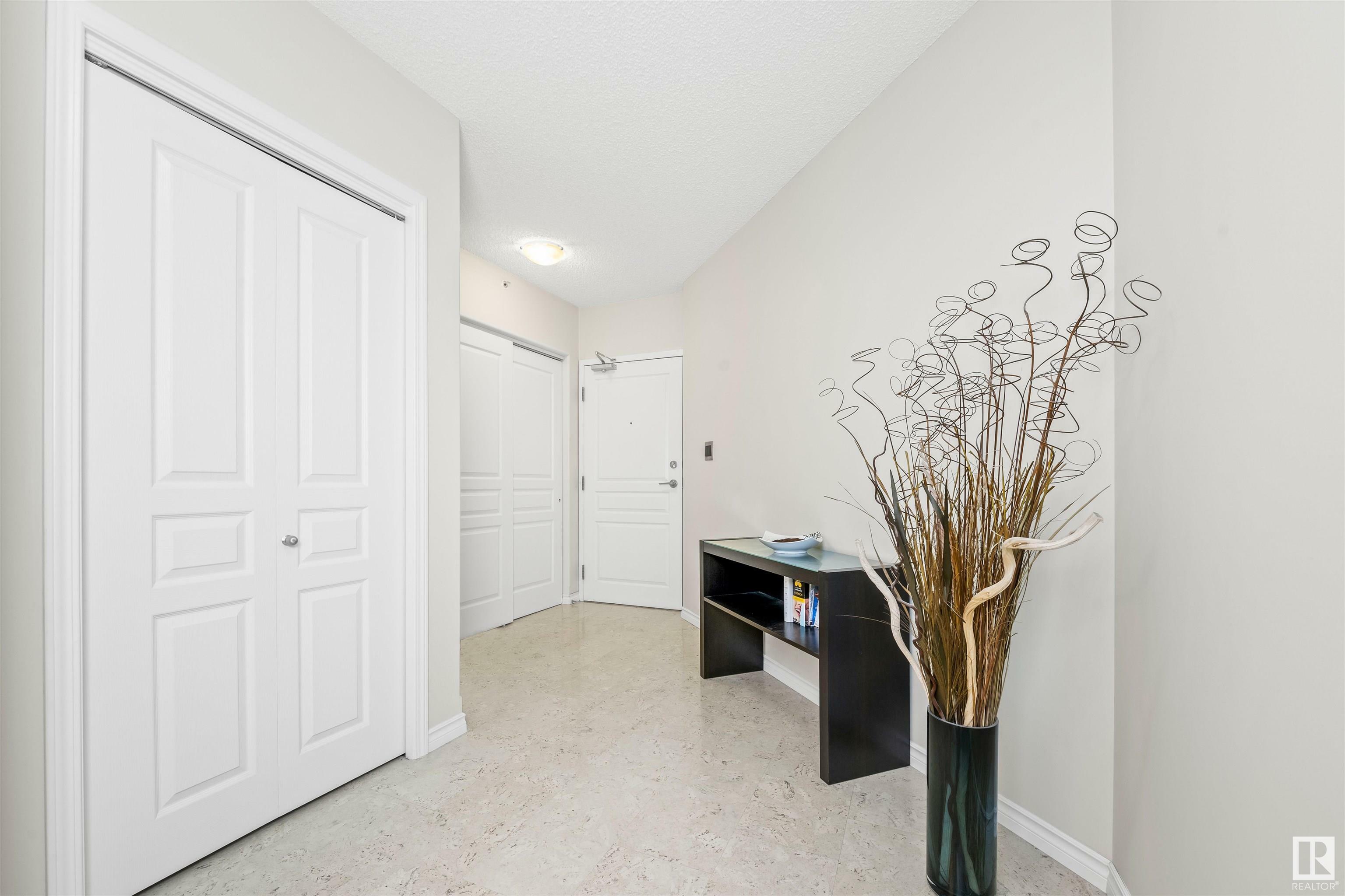 Property Photo: 9707 106 Street NW 201 AB T5K 0B7
