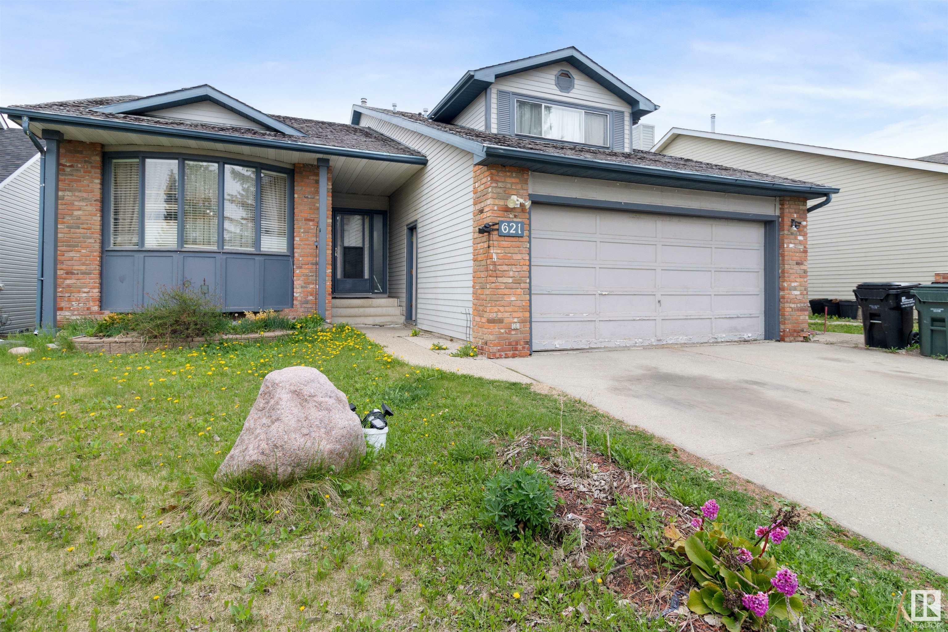 Property Photo: 621 Village Drive AB T8A 4K7