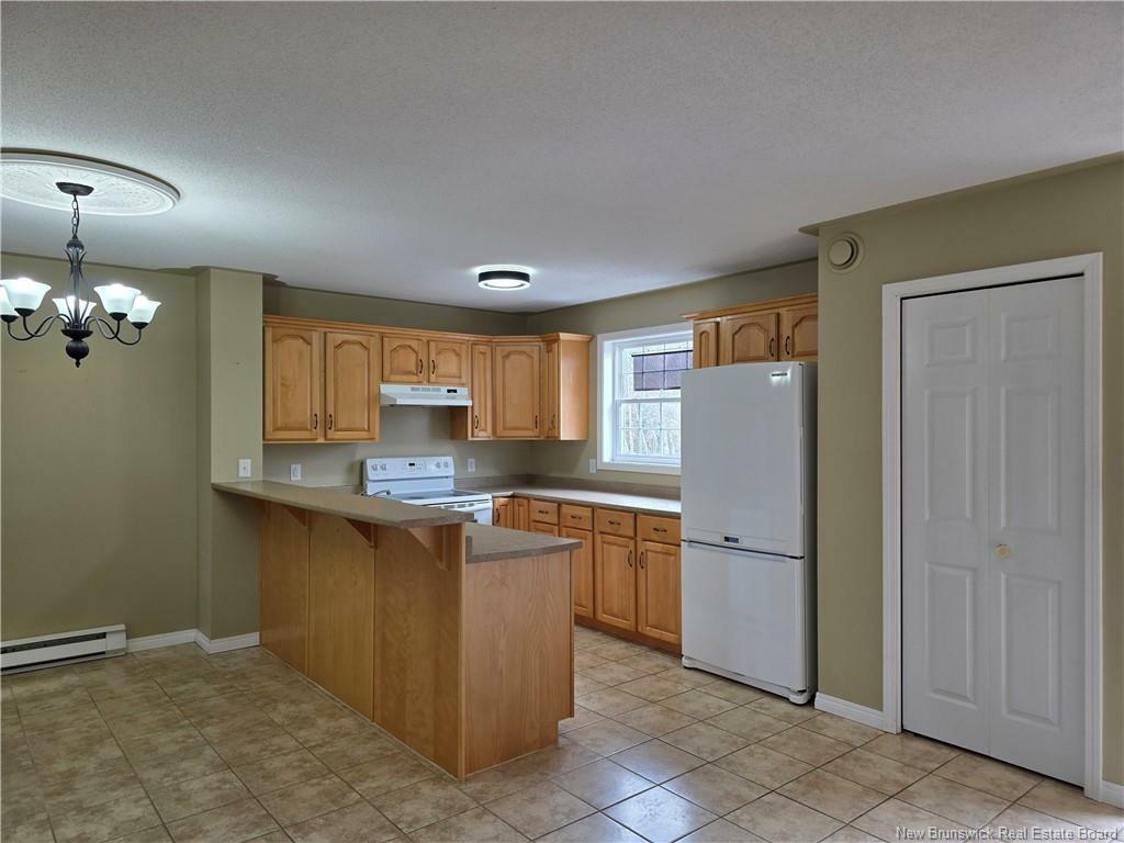Property Photo: 703 Brookside Drive NB E3G 8T9