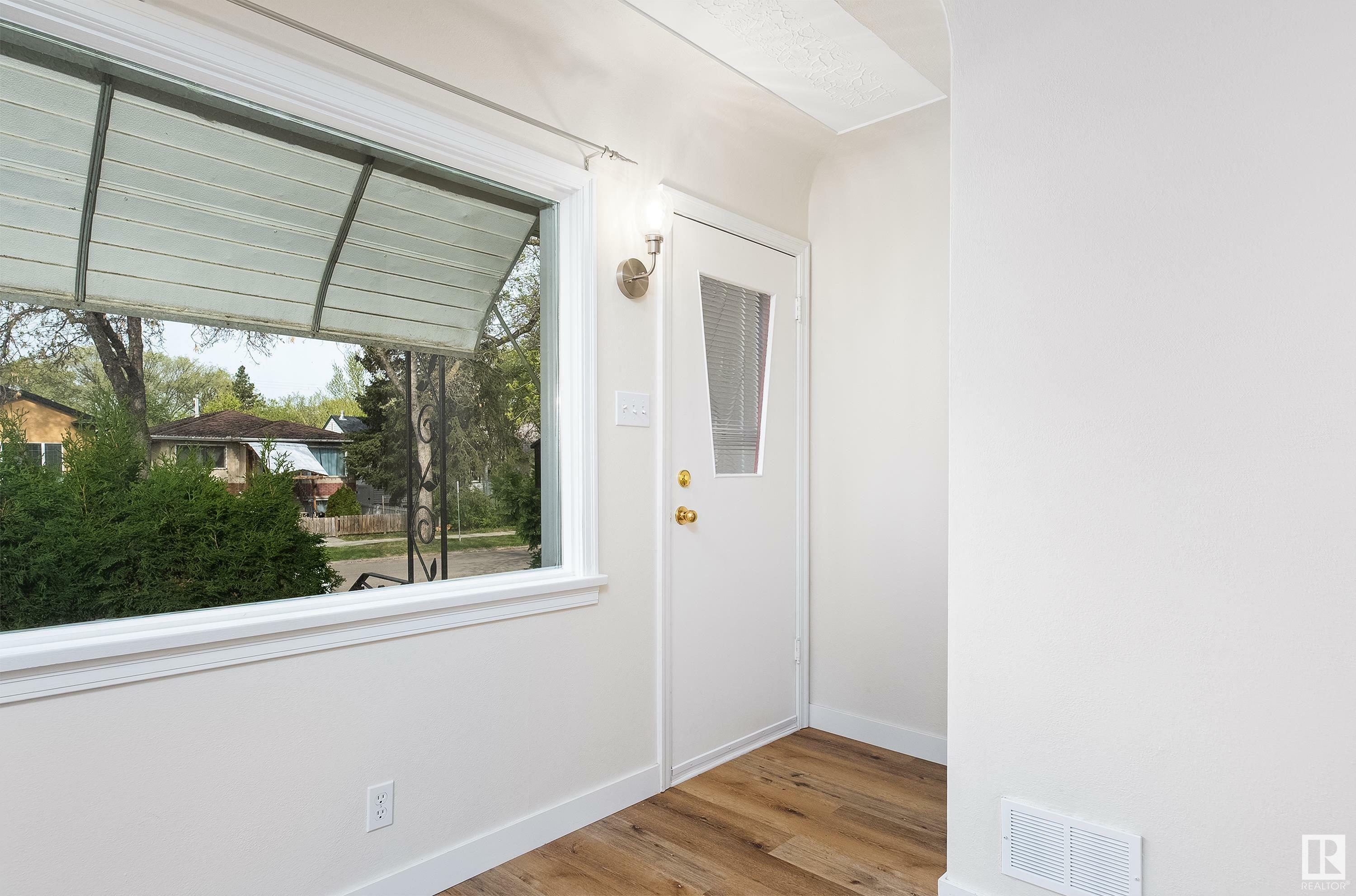 Property Photo: 11637 89 Street NW AB T5B 3V3