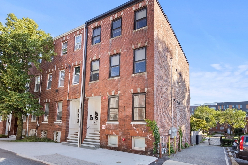 Property Photo: 211 W 9th St. 1 MA 02127