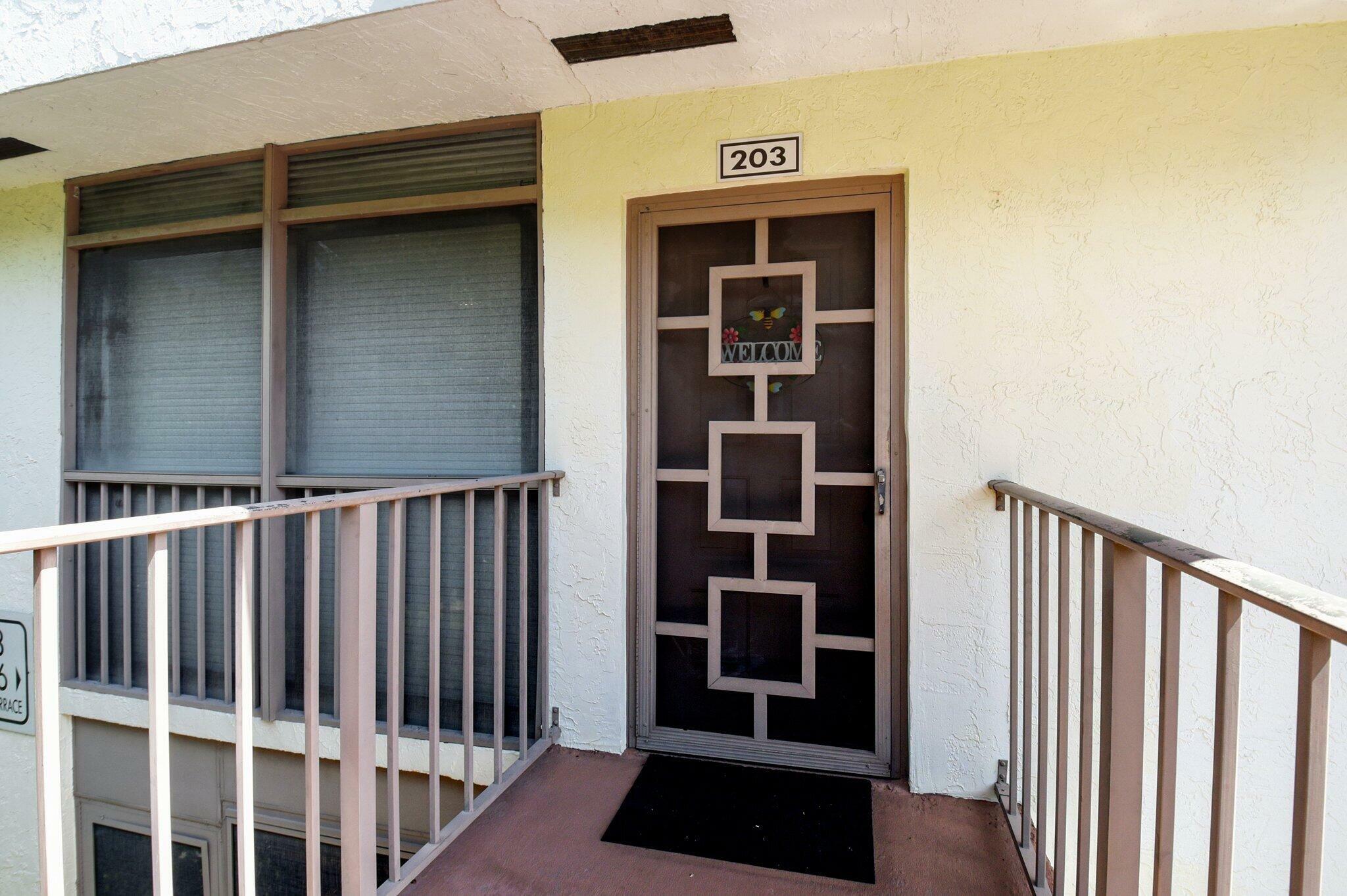 Property Photo: 6586 Southurst Terrace 203 FL 33446