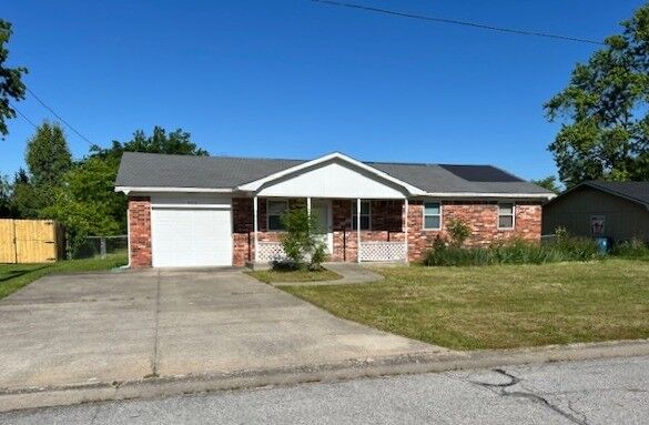 Property Photo:  902 SE G Street  AR 72712 