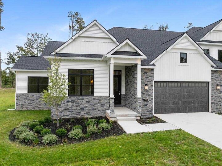 Property Photo:  807 Fairways  MI 49740 