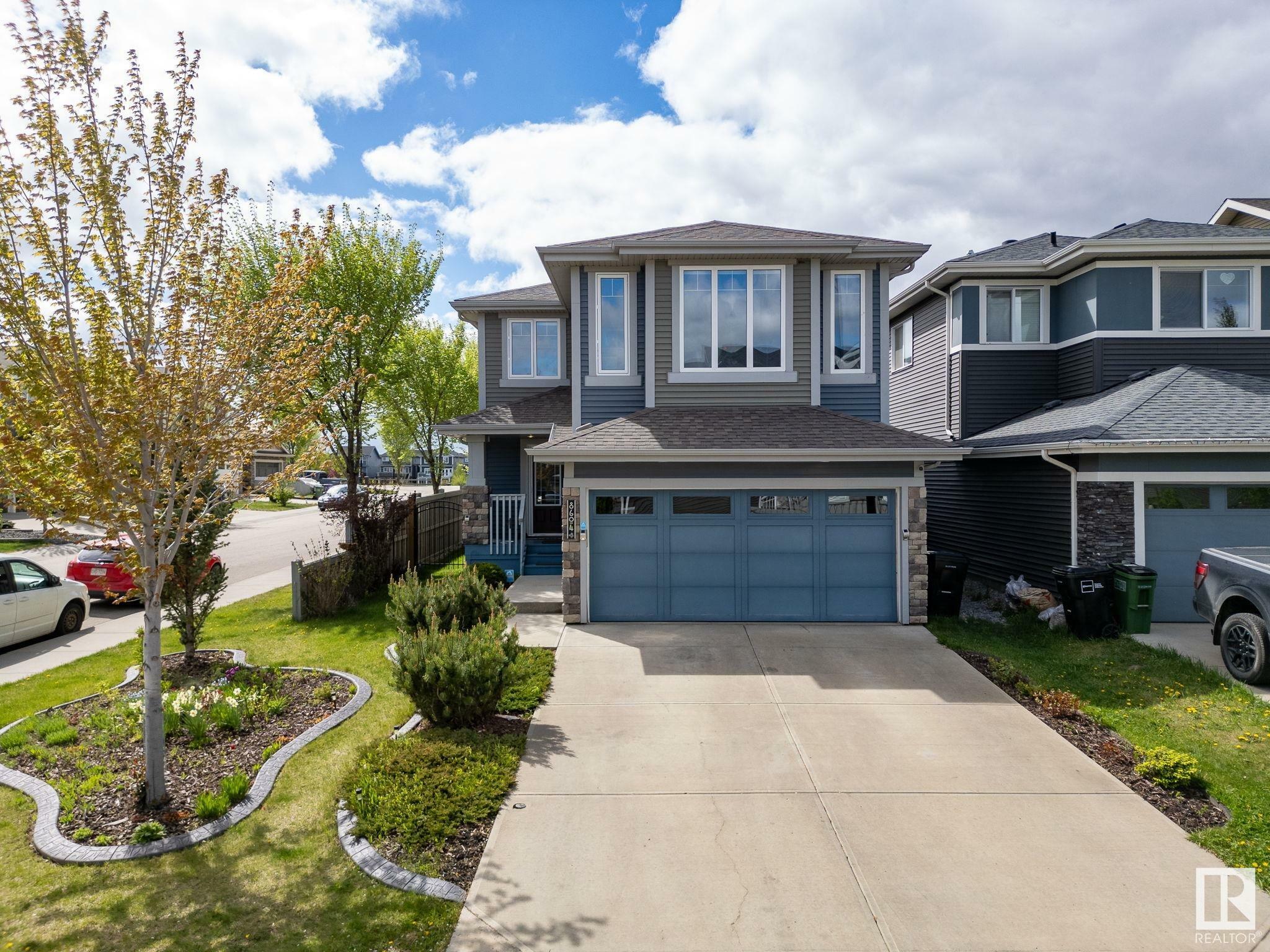Property Photo: 8604 217 Street NW AB T5T 4R5