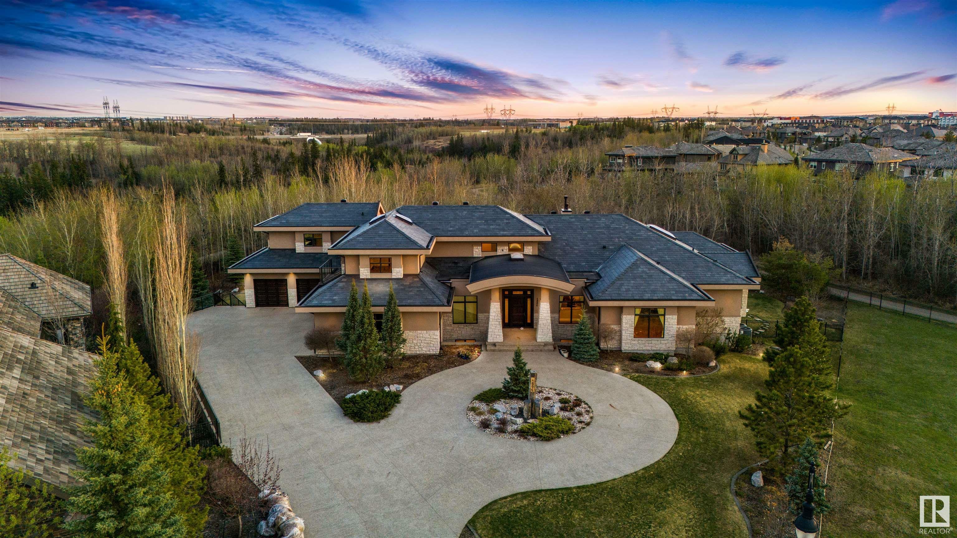 Property Photo: 4806 Mactaggart Crest Crest NW AB T6R 0J6