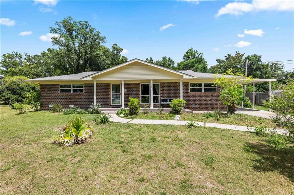 Property Photo: 7410 Helton Drive AL 36535