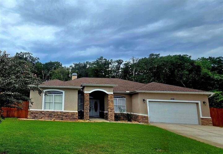 Property Photo: 10305 Worthy Lamb Way FL 34654