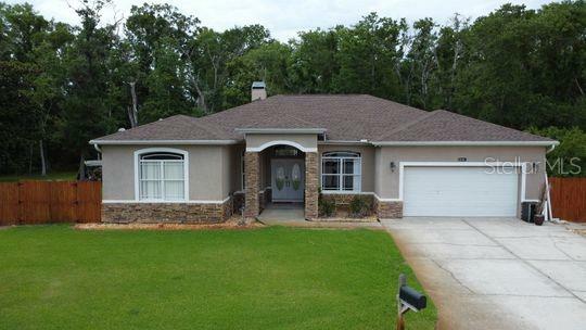 Property Photo: 10305 Worthy Lamb Way FL 34654