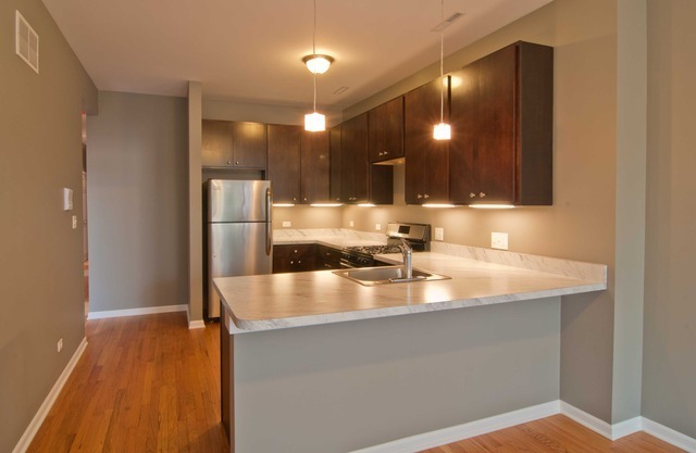 Property Photo: 2447 N Lowell Avenue 1 IL 60639