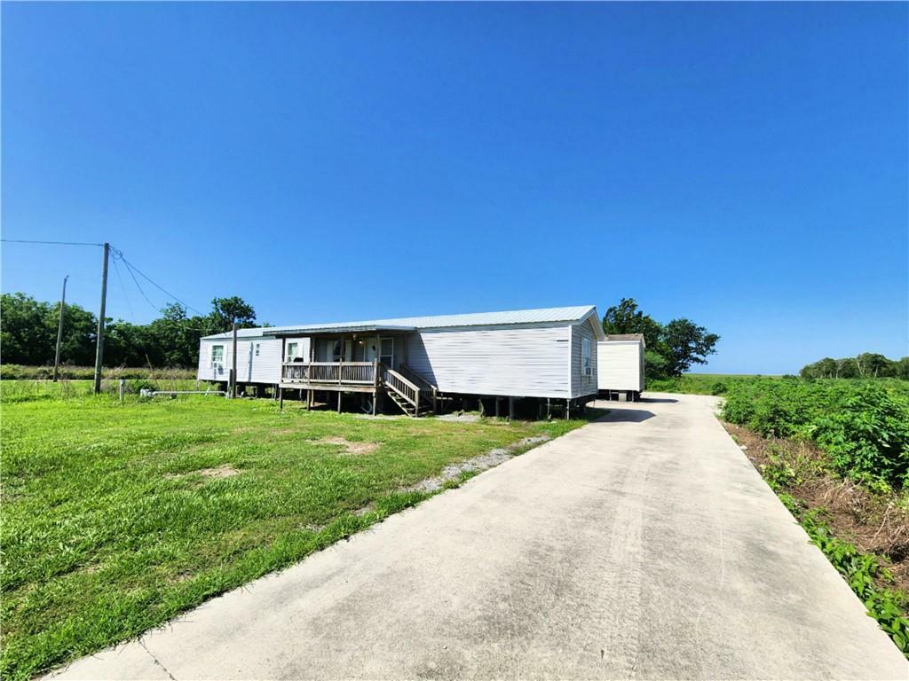 Property Photo: 30142 & 30144 Highway 23 LA 70083