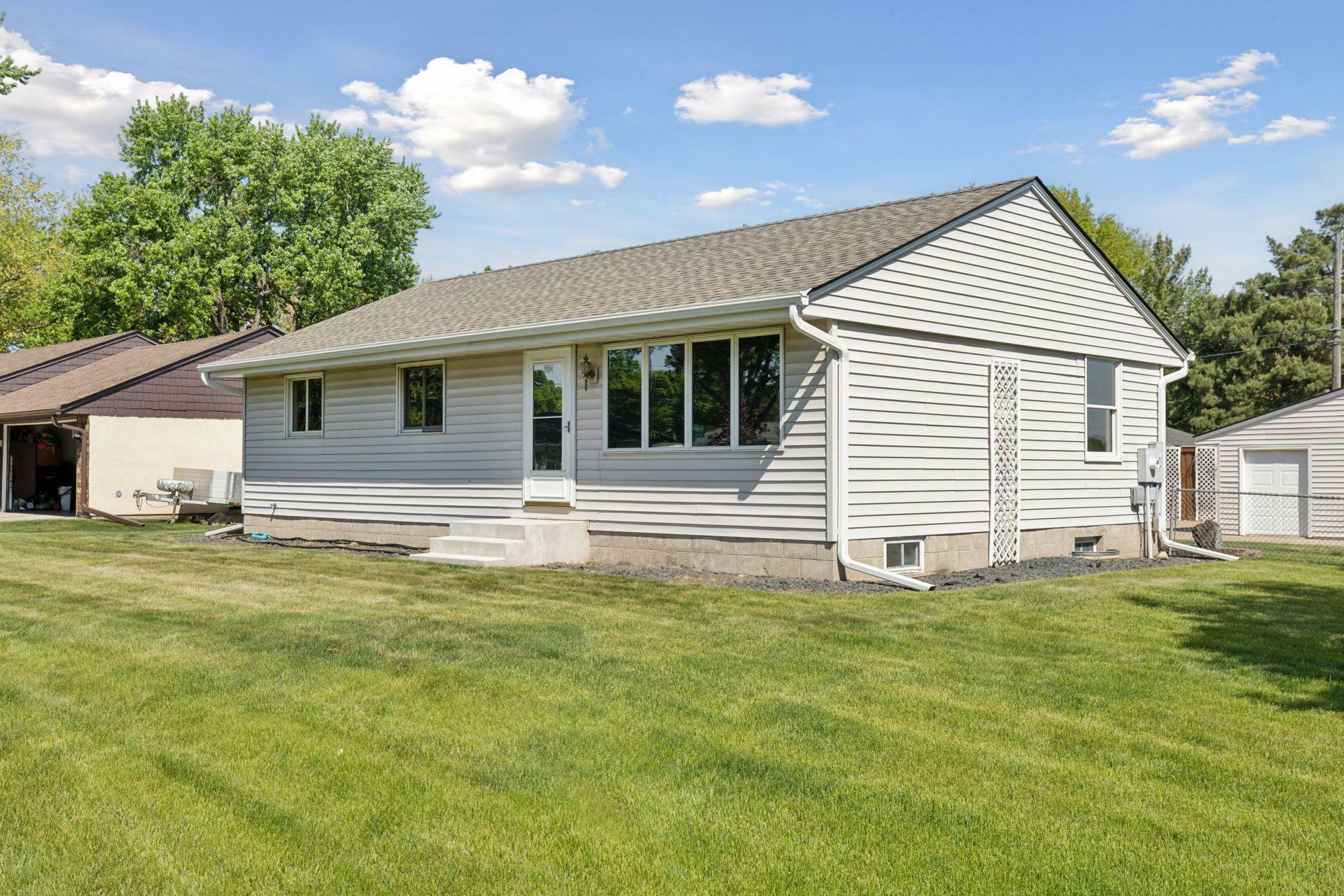 Property Photo: 9904 95th Avenue N MN 55369