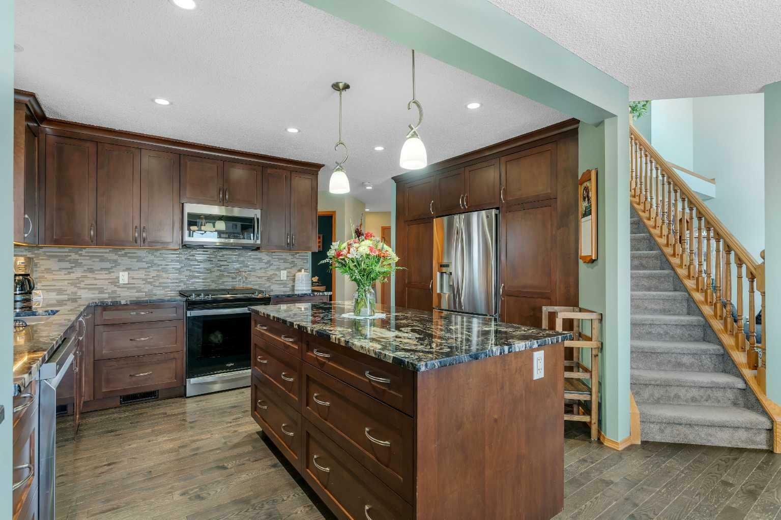 Property Photo: 228 Macewan Park View NW AB T3K 4K2