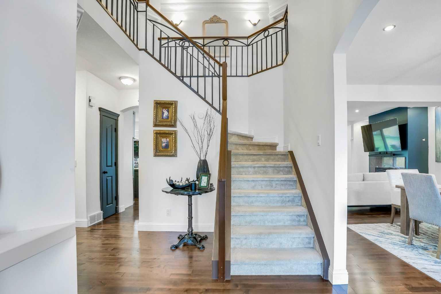 Property Photo: 115 Patterson Drive SW AB T3H 3B2