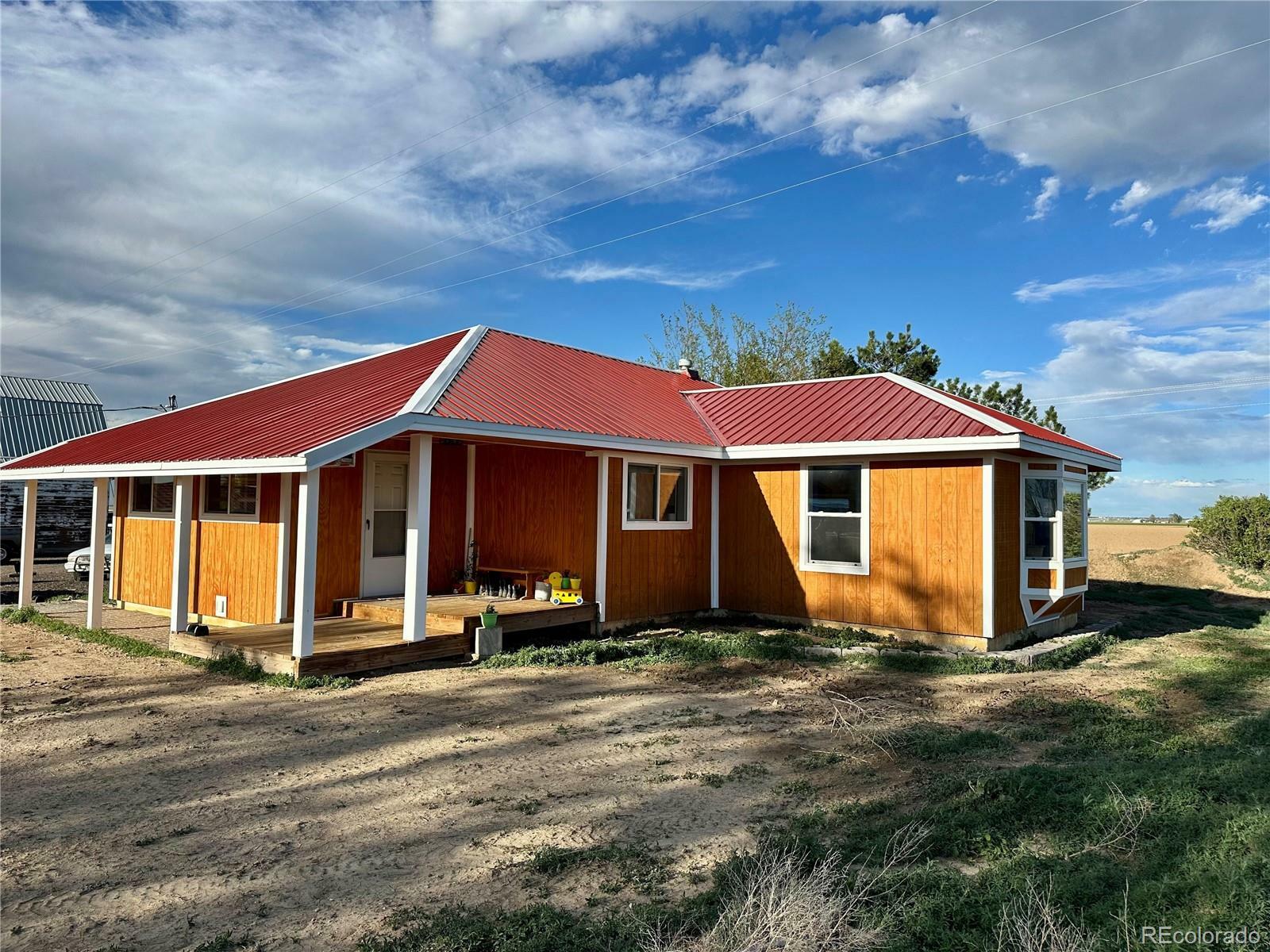 Property Photo: 7013 County Road 69 CO 80643