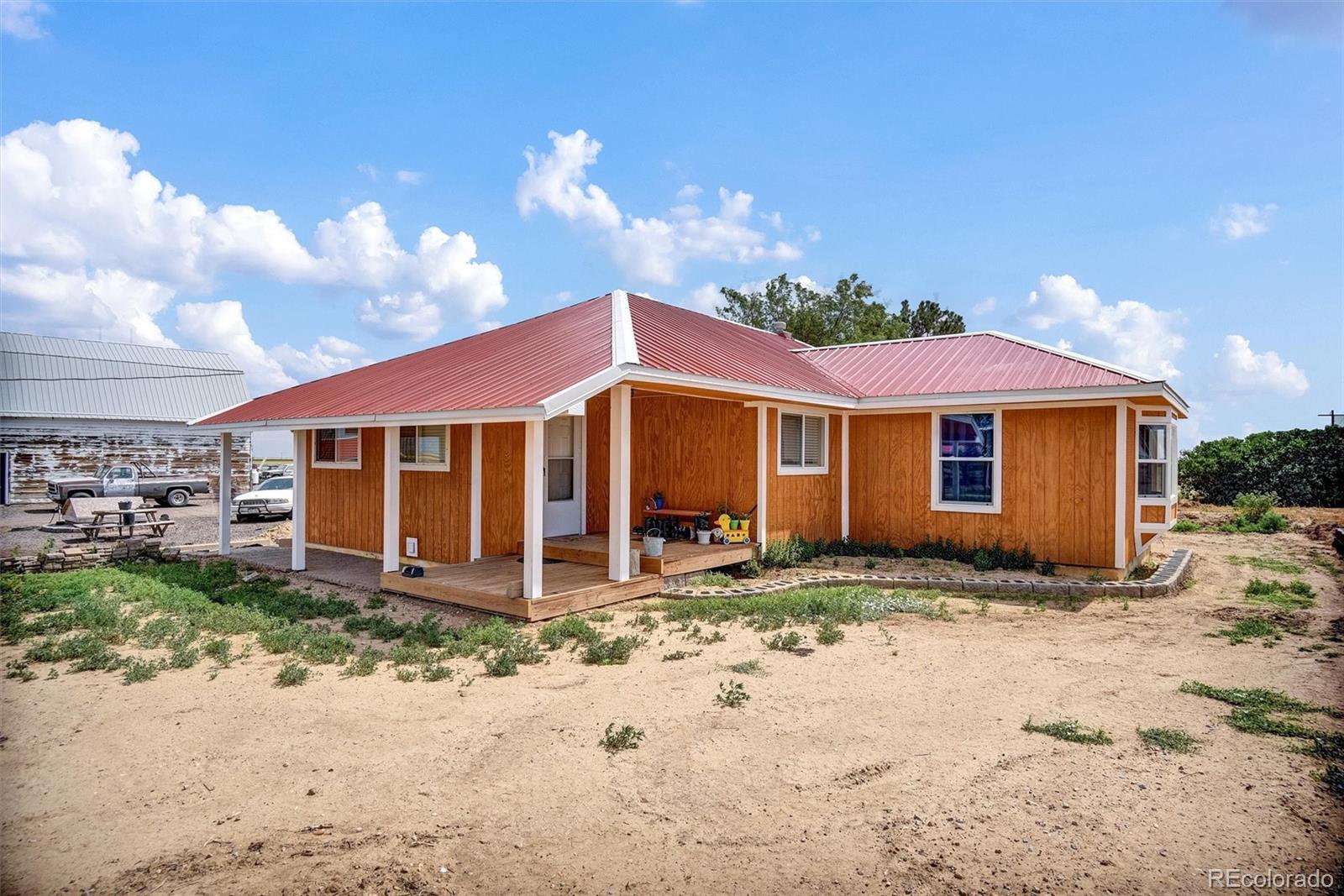 Property Photo: 7013 County Road 69 CO 80643