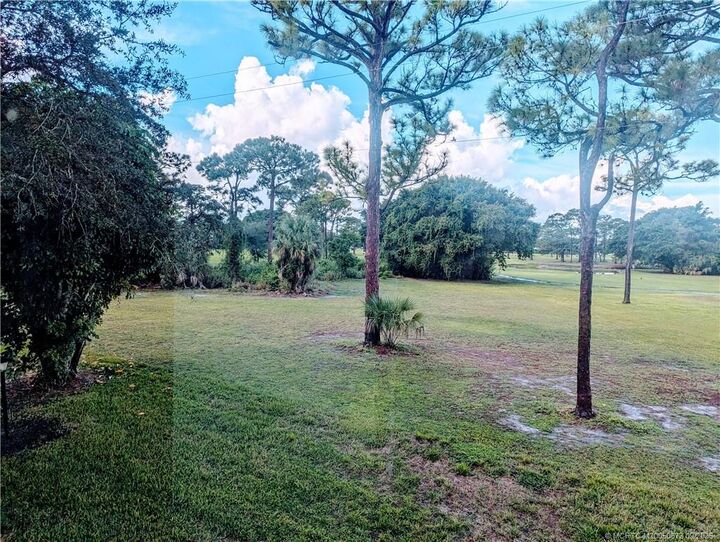 Property Photo:  1225 NW 21st Street  FL 34994 