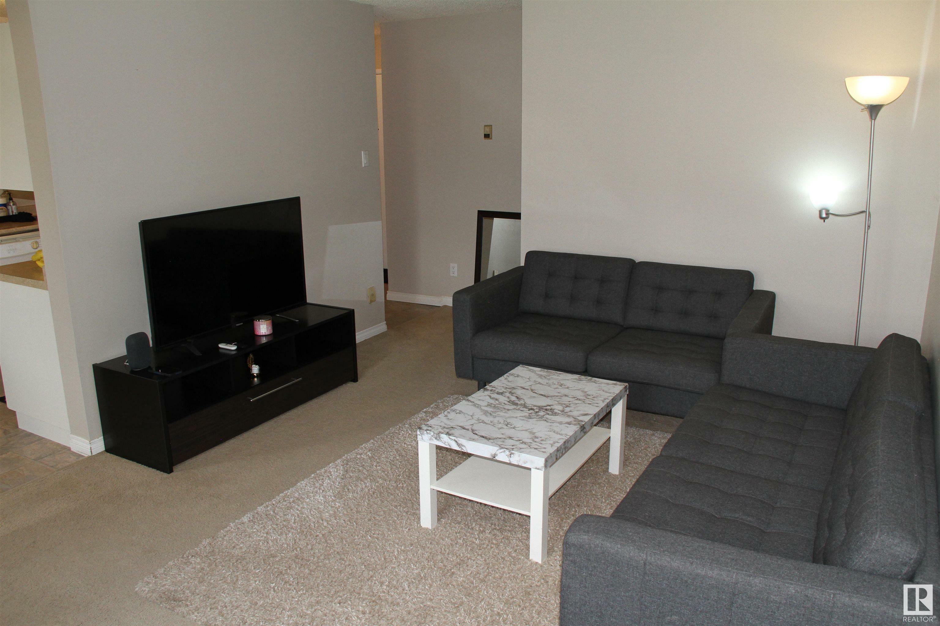 Property Photo: 237 Woodvale Rd NW 105 AB T6L 1E5