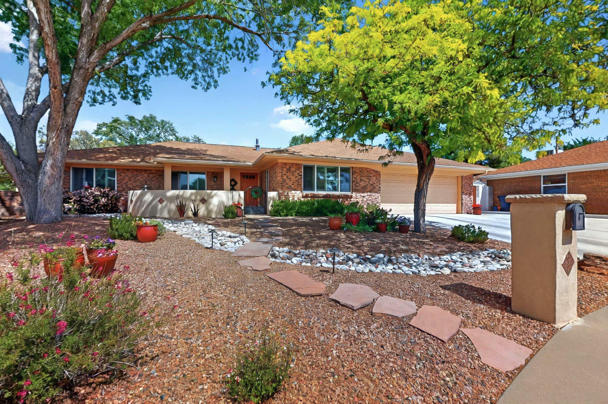 Property Photo: 7625 Arroyo Del Oso Avenue NE NM 87109