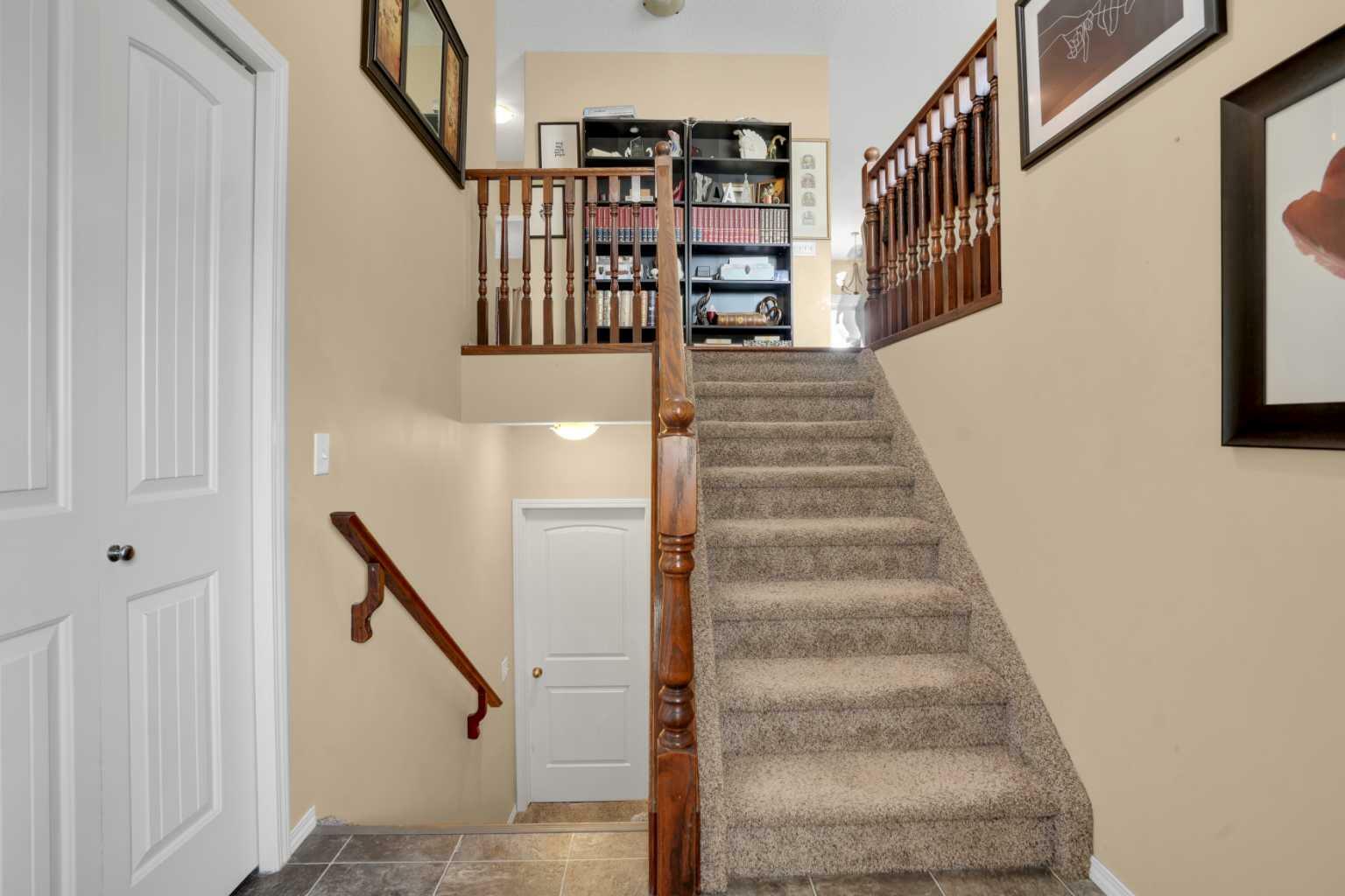Property Photo: 1114 Highland Green View NW AB T1V 1X2