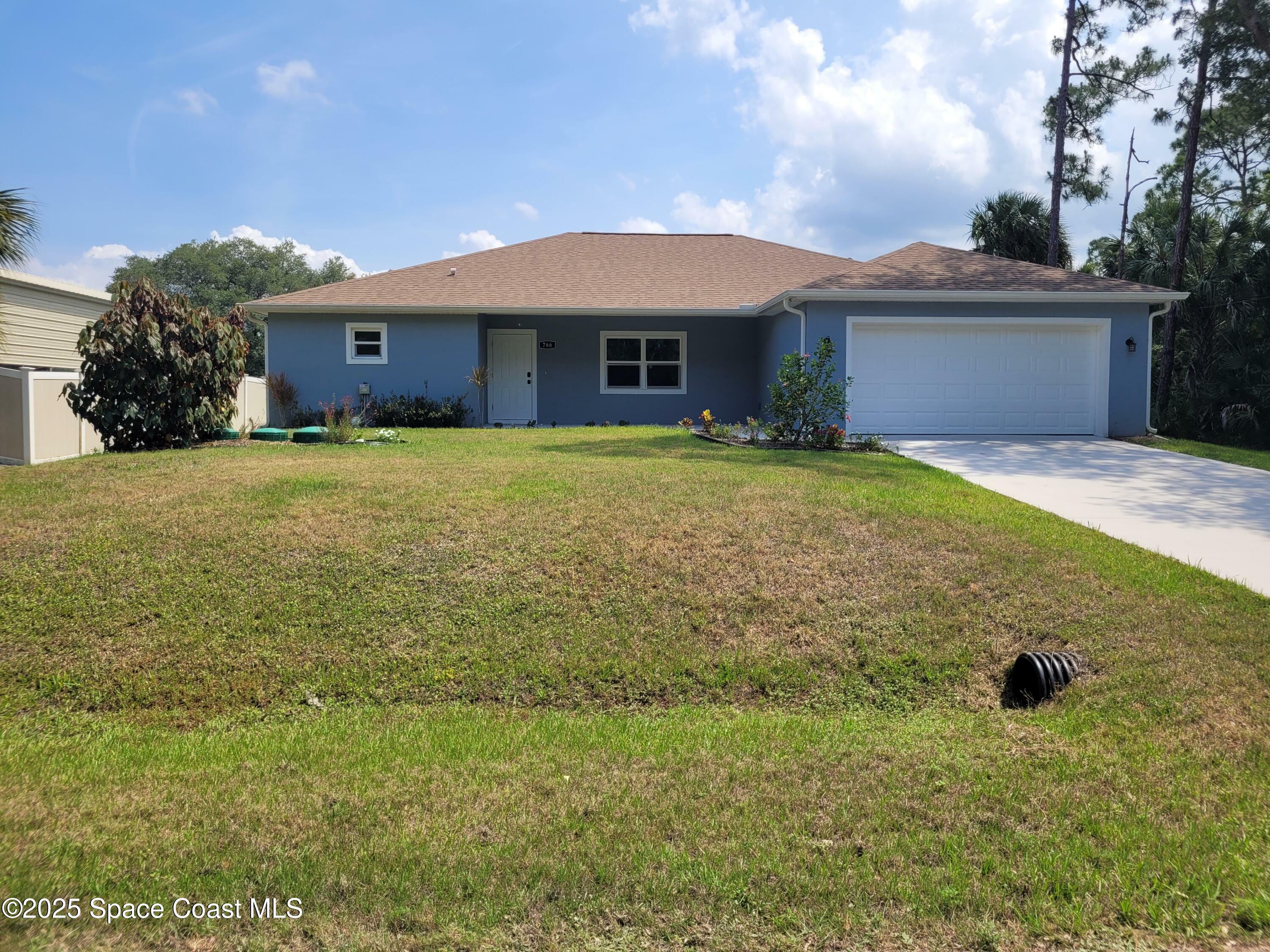 Property Photo: 766 Tooley Road SW FL 32908