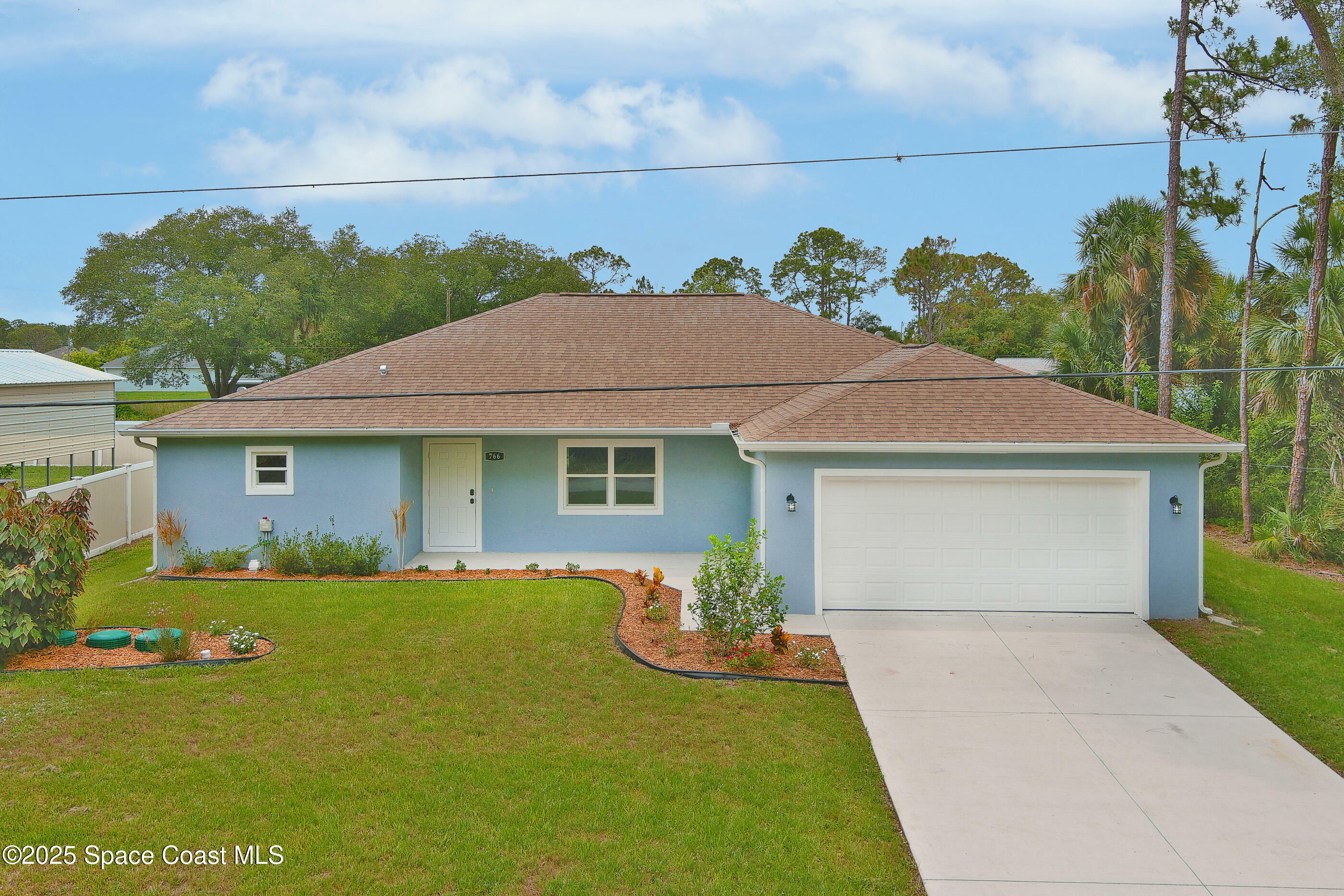 Property Photo: 766 Tooley Road SW FL 32908