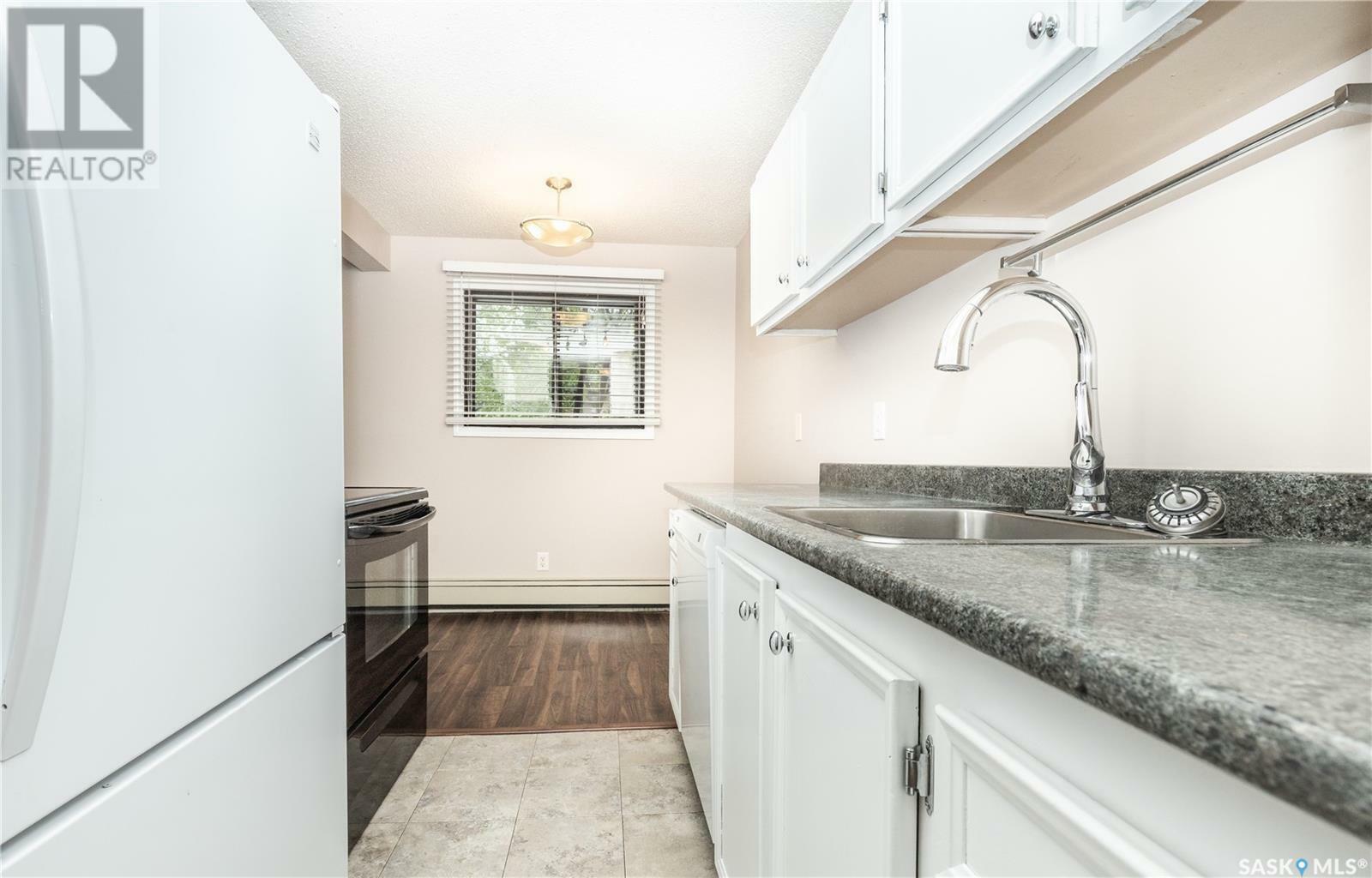 Property Photo:  306 720 8th Street E  SK S7H 0R3 