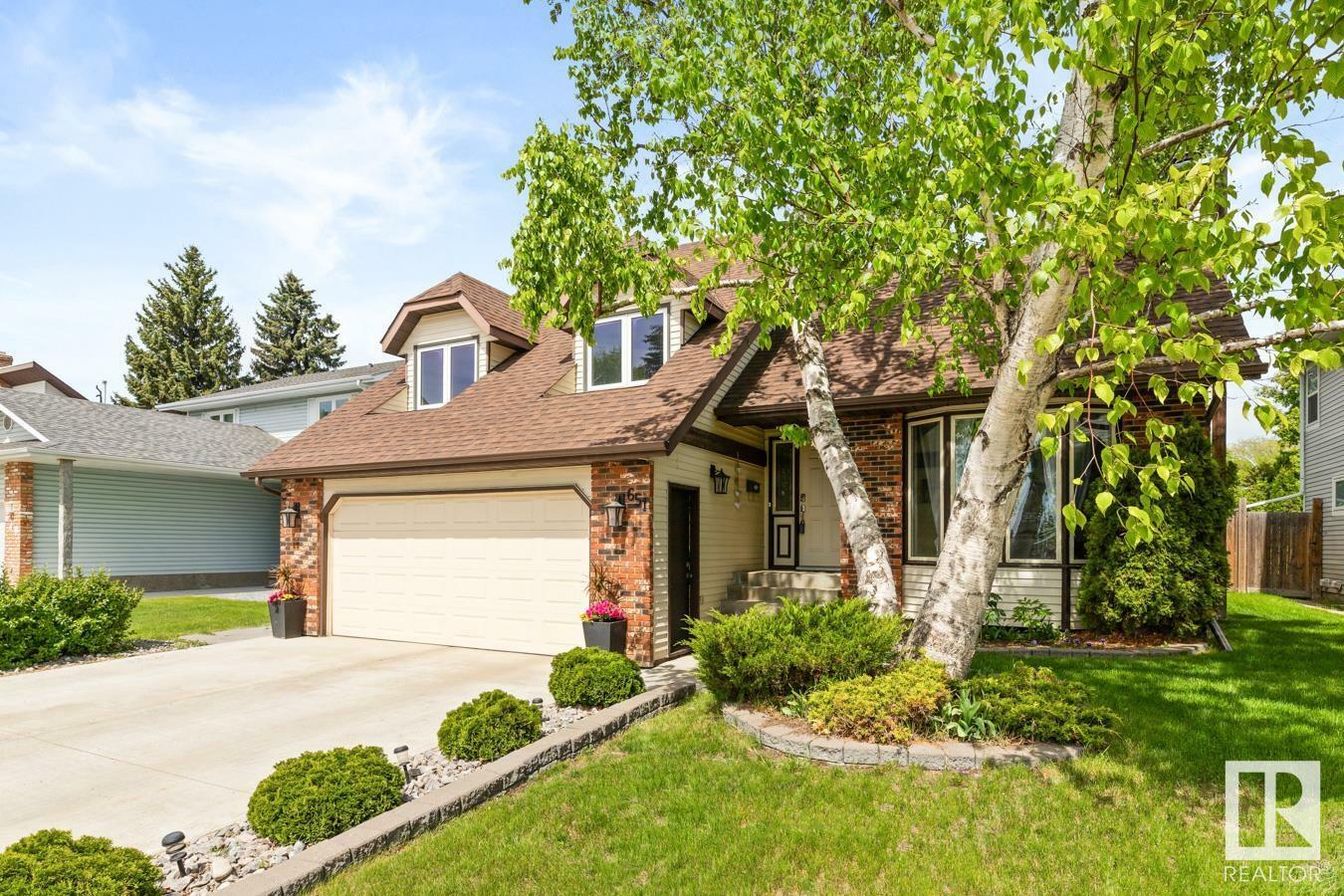 Property Photo: 651 Village Drive AB T8A 4K7