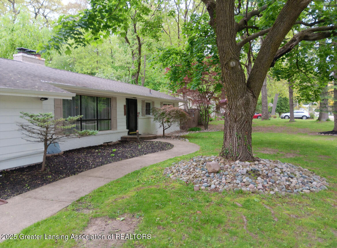 Property Photo:  1504 Forest Hills Drive  MI 48864 