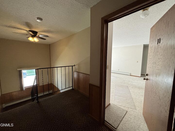 Property Photo:  2126 Kavaney Drive N 10  ND 58501 