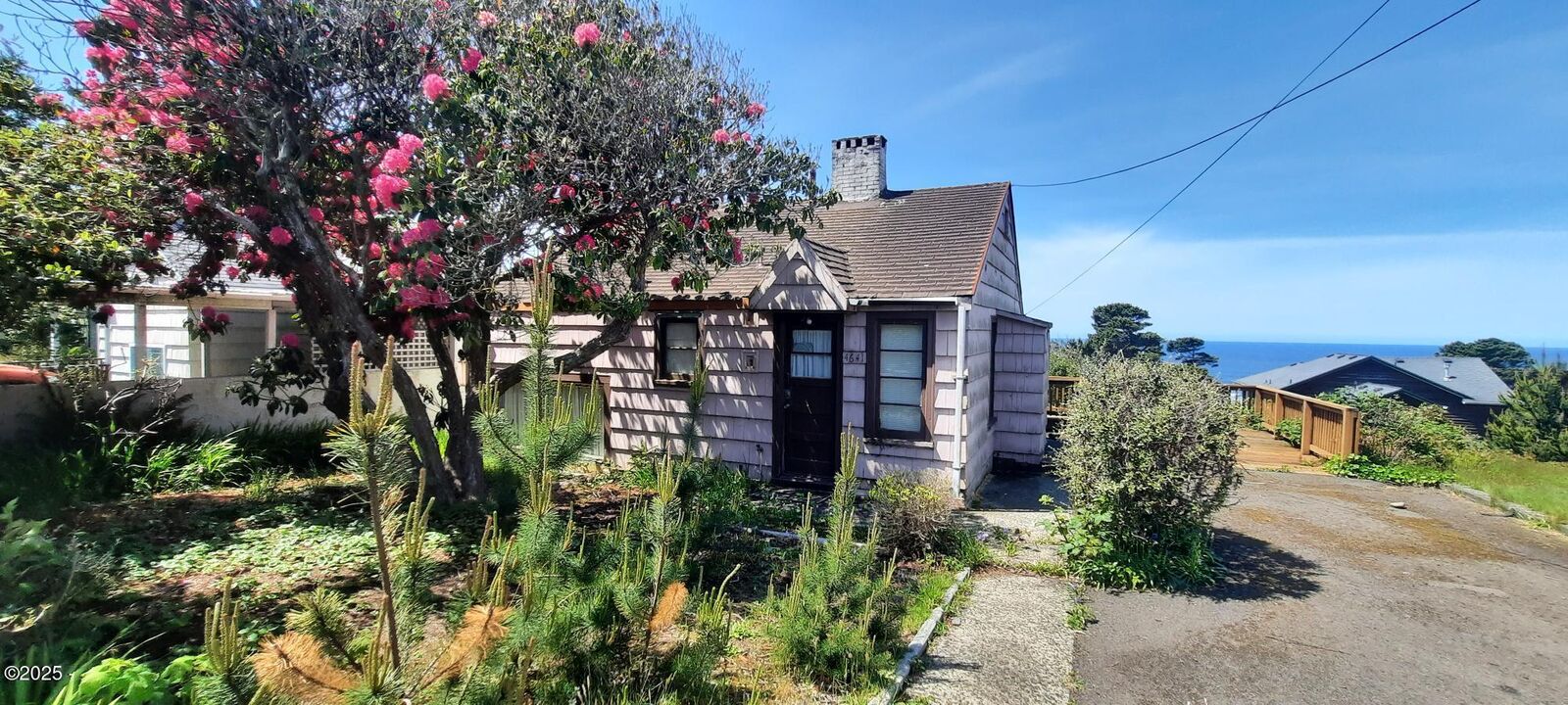 Property Photo:  4641 SW Coast Avenue  OR 97367 