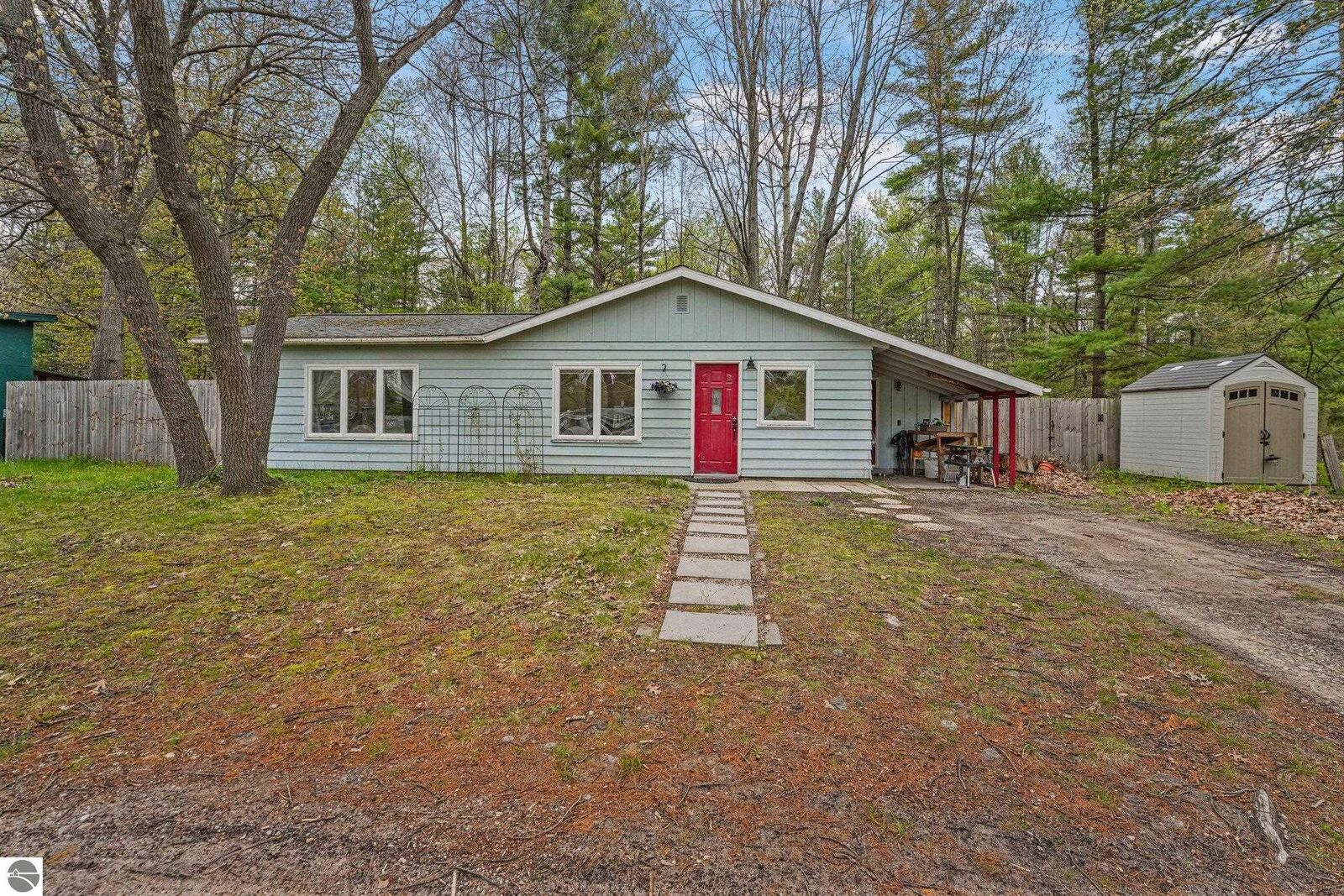 Property Photo:  1615 Pine Drive  MI 49686 