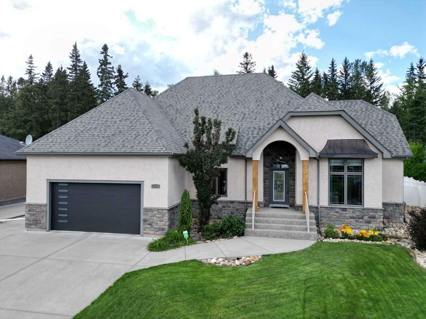 Property Photo: 5612 16 Avenue AB T7E 1X1