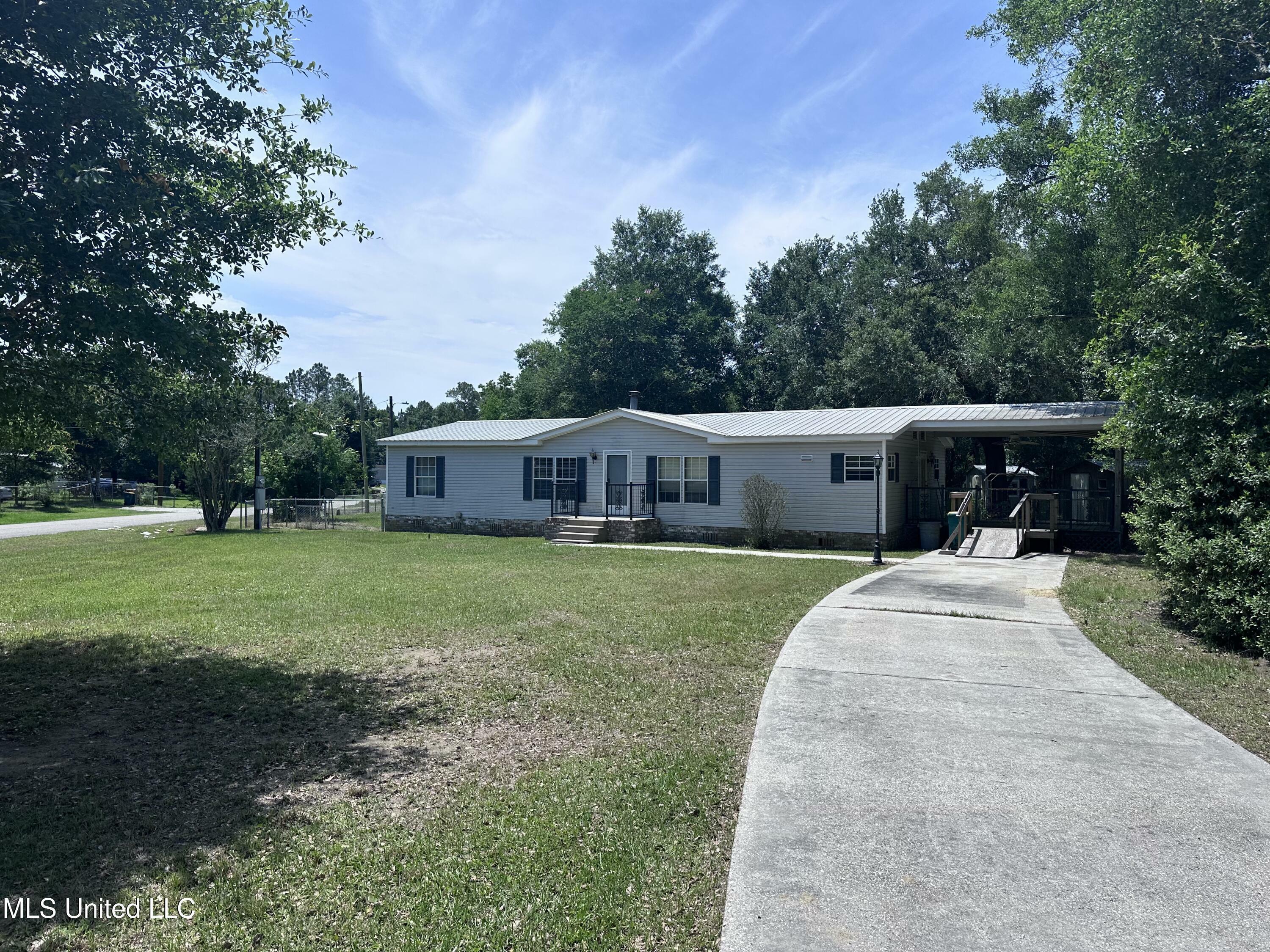 Property Photo: 18241 Robin Oaks Drive MS 39503