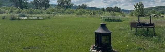Property Photo:  2235 Dr East Natures Hideaway Road  AB T1S 3Z4 