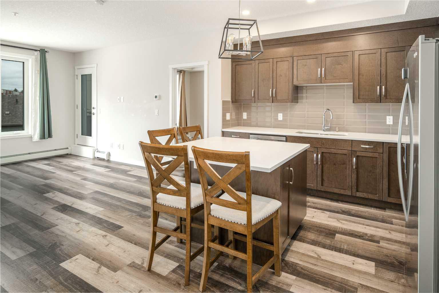 Property Photo: 30 Shawnee Common SW 308 AB T2Y 0R1