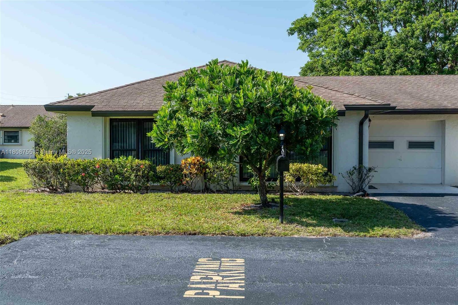 Property Photo:  10198 Dovewood Ln A  FL 33436 