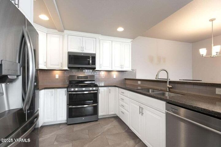Property Photo:  8905 Occidental Rd 202A  WA 98903 