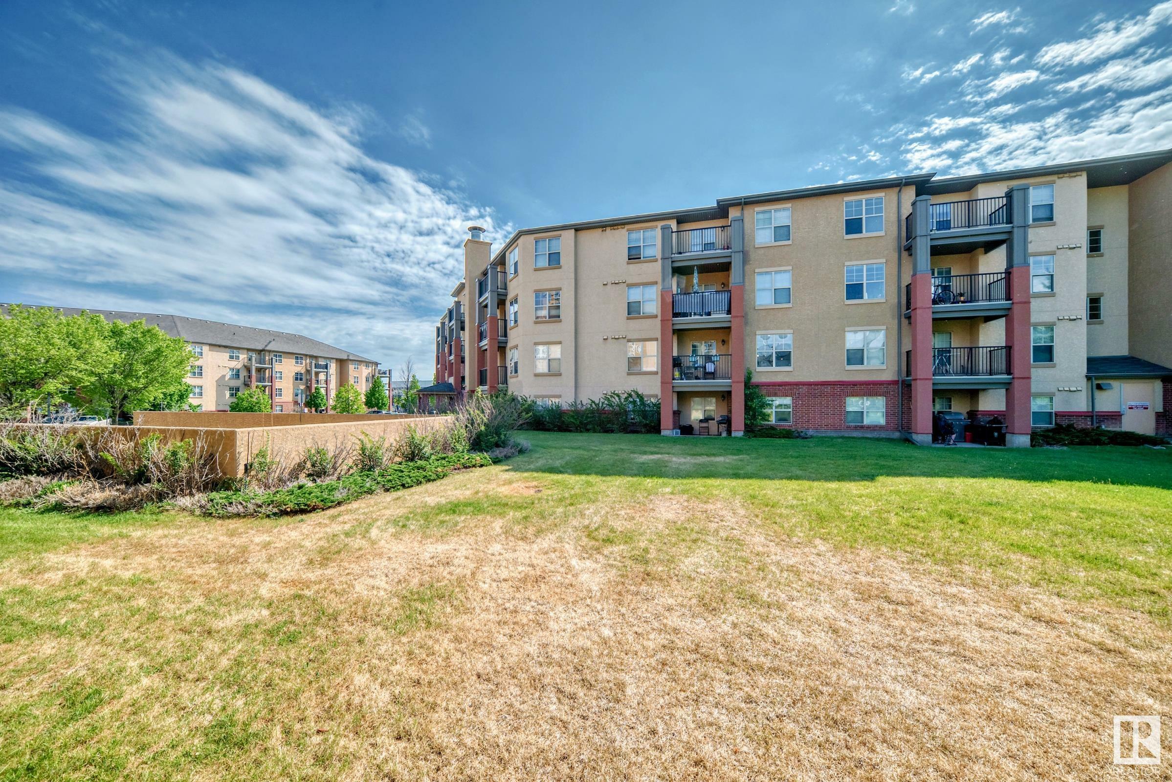 Property Photo: 11453 Ellerslie Road SW 305 AB T6W 1T2