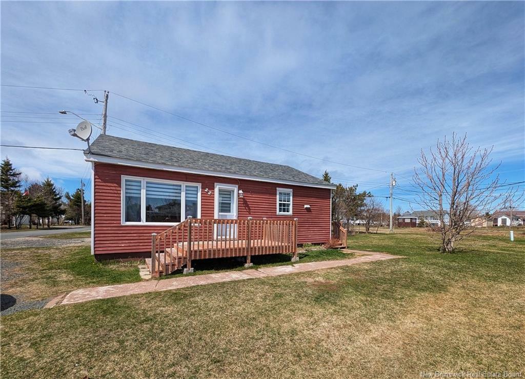 Property Photo: 22 De La Source Street NB E8S 1Z3