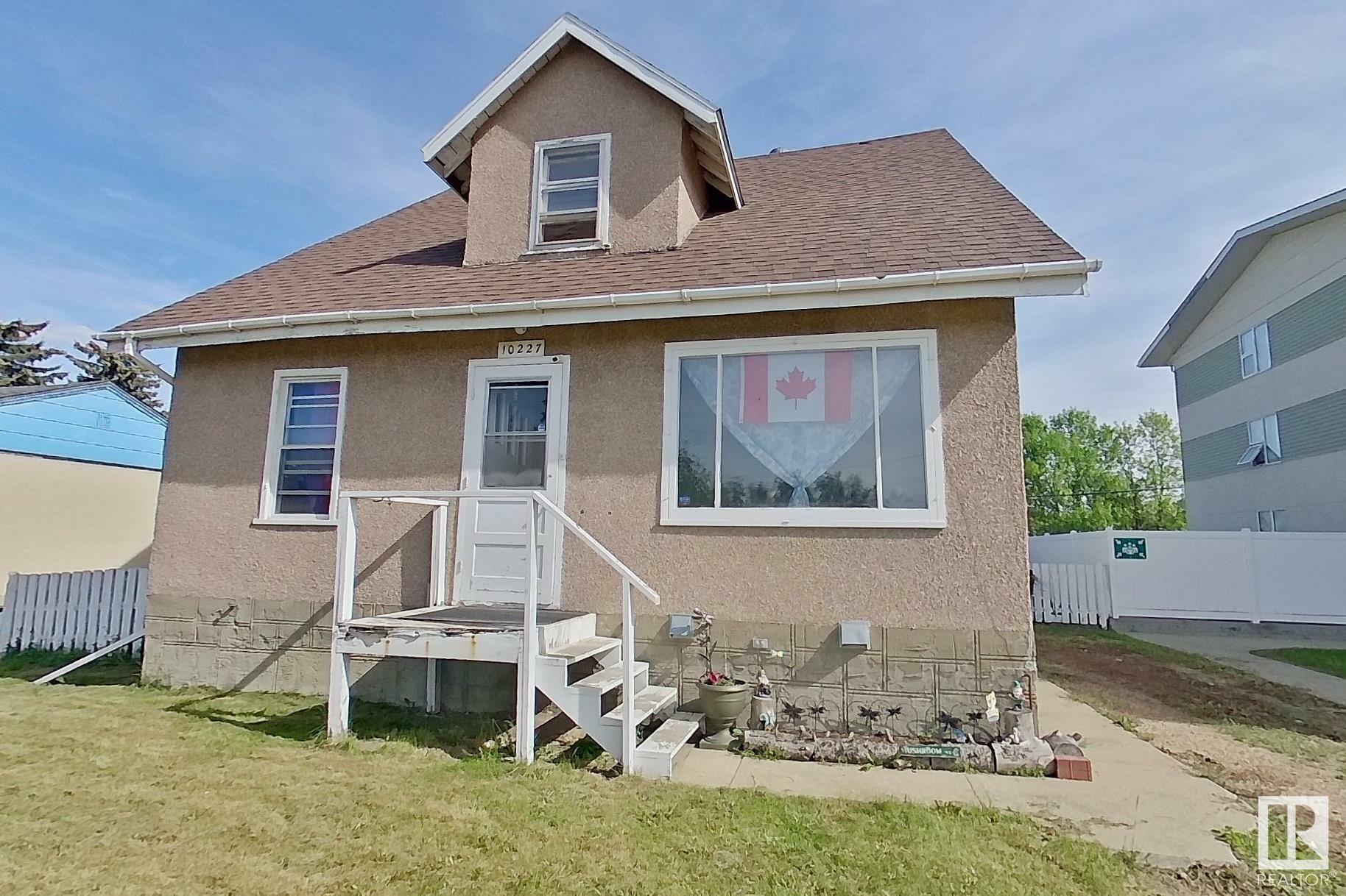 Property Photo: 10227 107 Street AB T7P 1X1