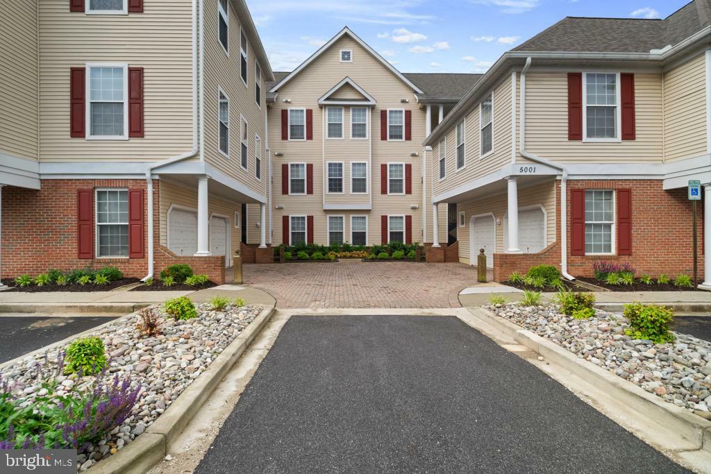 Property Photo:  5001 Hollington Drive 305  MD 21117 