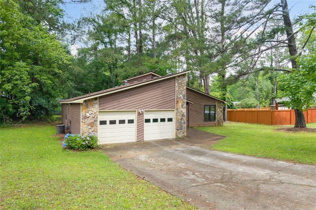 Property Photo:  9383 Woodknoll Way  GA 30238 