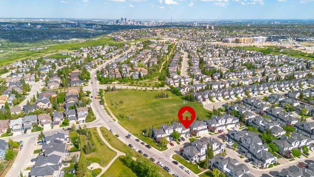 Property Photo:  281 Cougar Ridge Drive SW 105  AB T3H 0J2 
