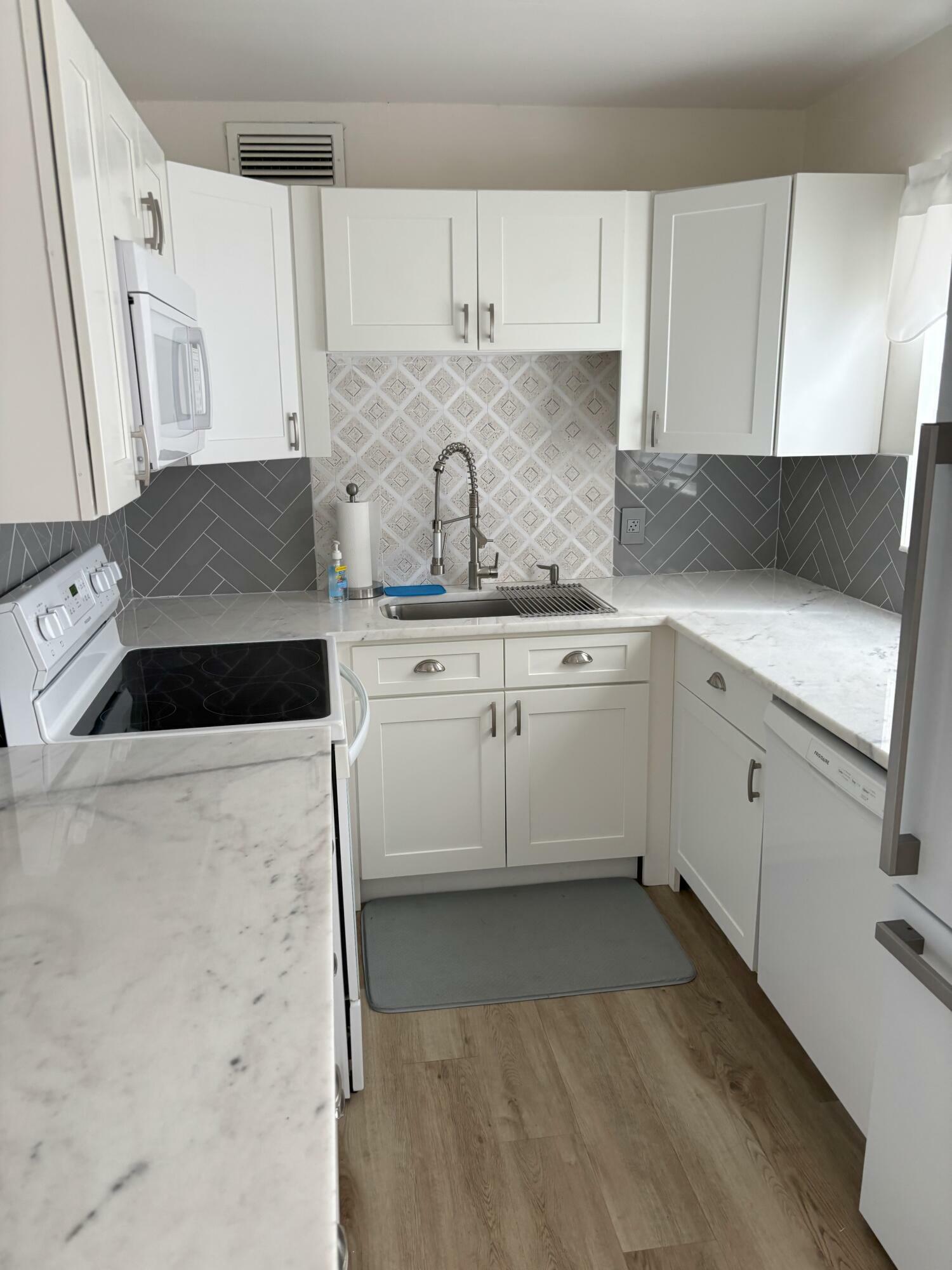 Property Photo: 216 Dorchester J FL 33417