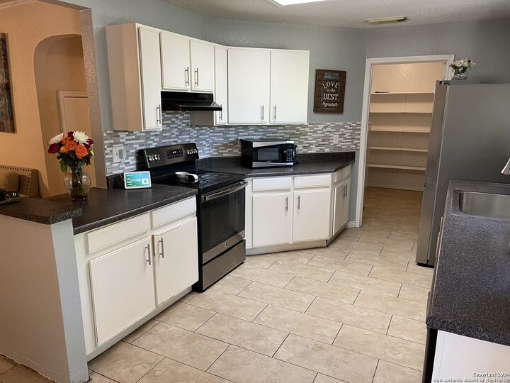 Property Photo:  9858 Menard Cir  TX 78245 